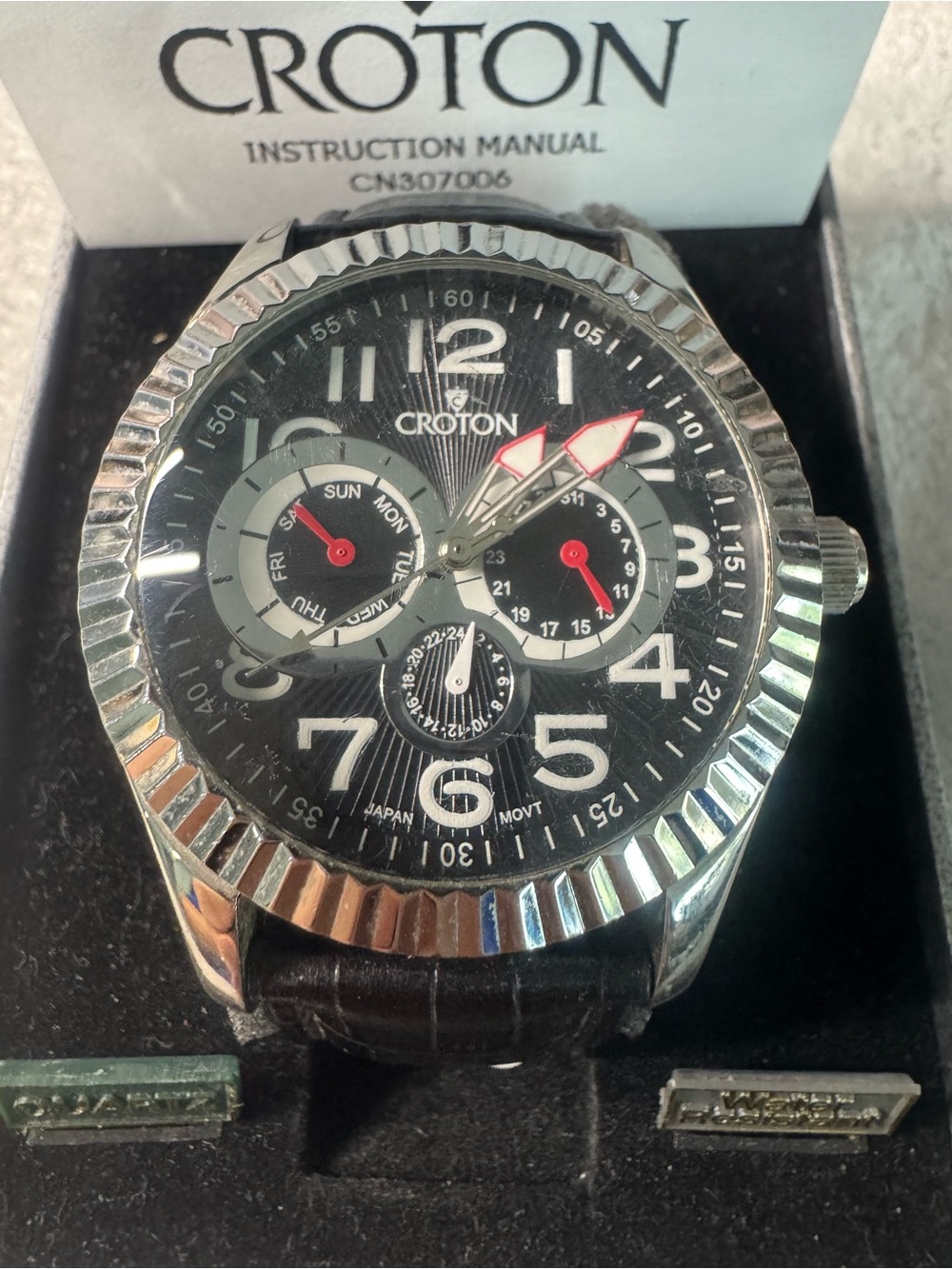 #107 Croton Black Dial Watch with Red Accents